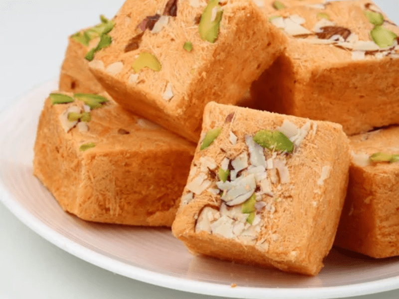 Manufacturer, Exporter, Importer, Supplier, Wholesaler, Retailer, Trader of Orange Soan Papdi in Kanpur, Uttar Pradesh, India.